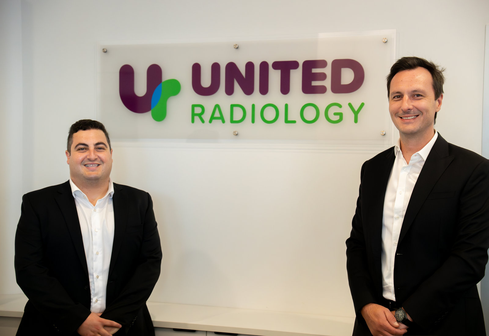 United Radiology team member with a patient